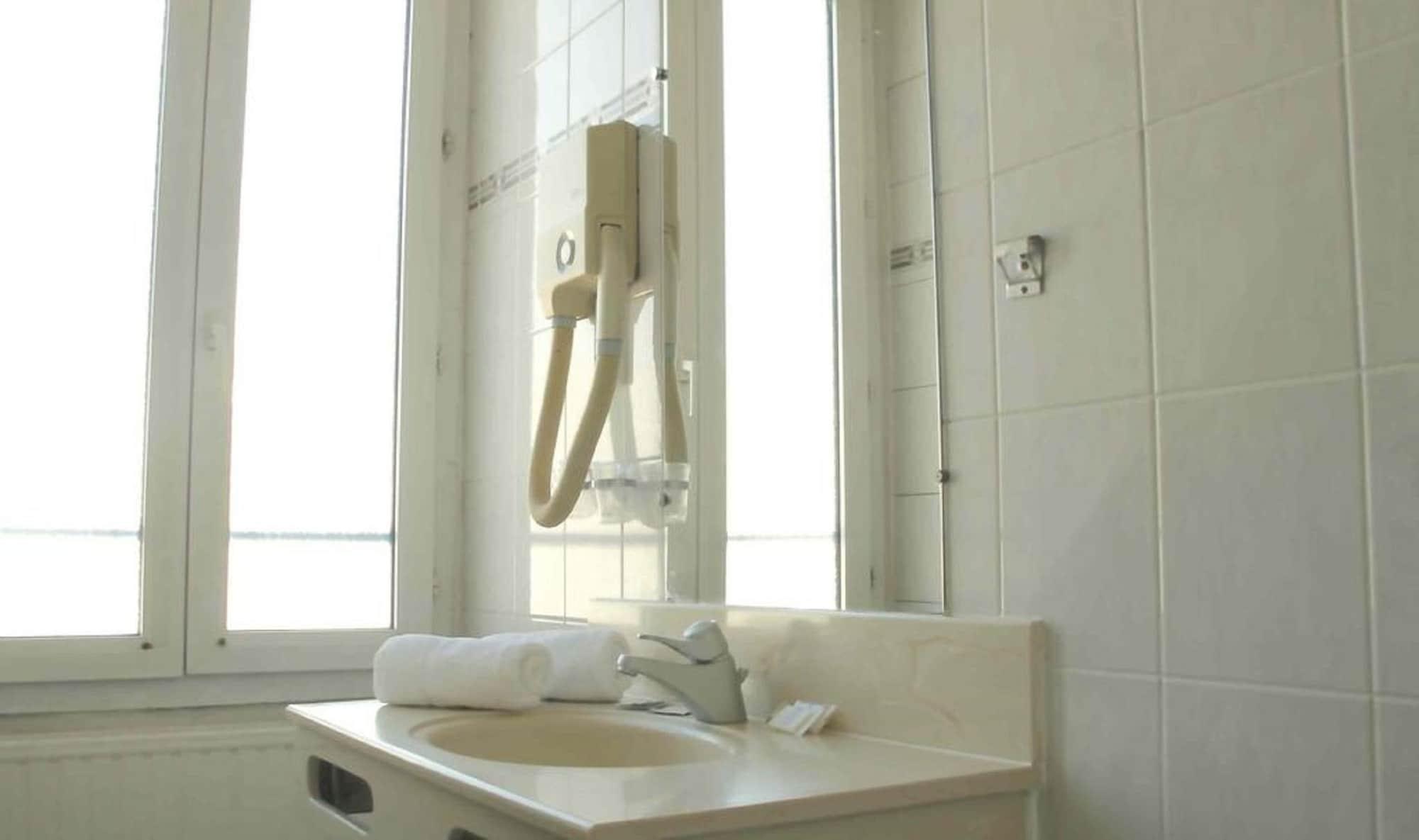 Hotel Chateau D'Eau Париж Стая снимка