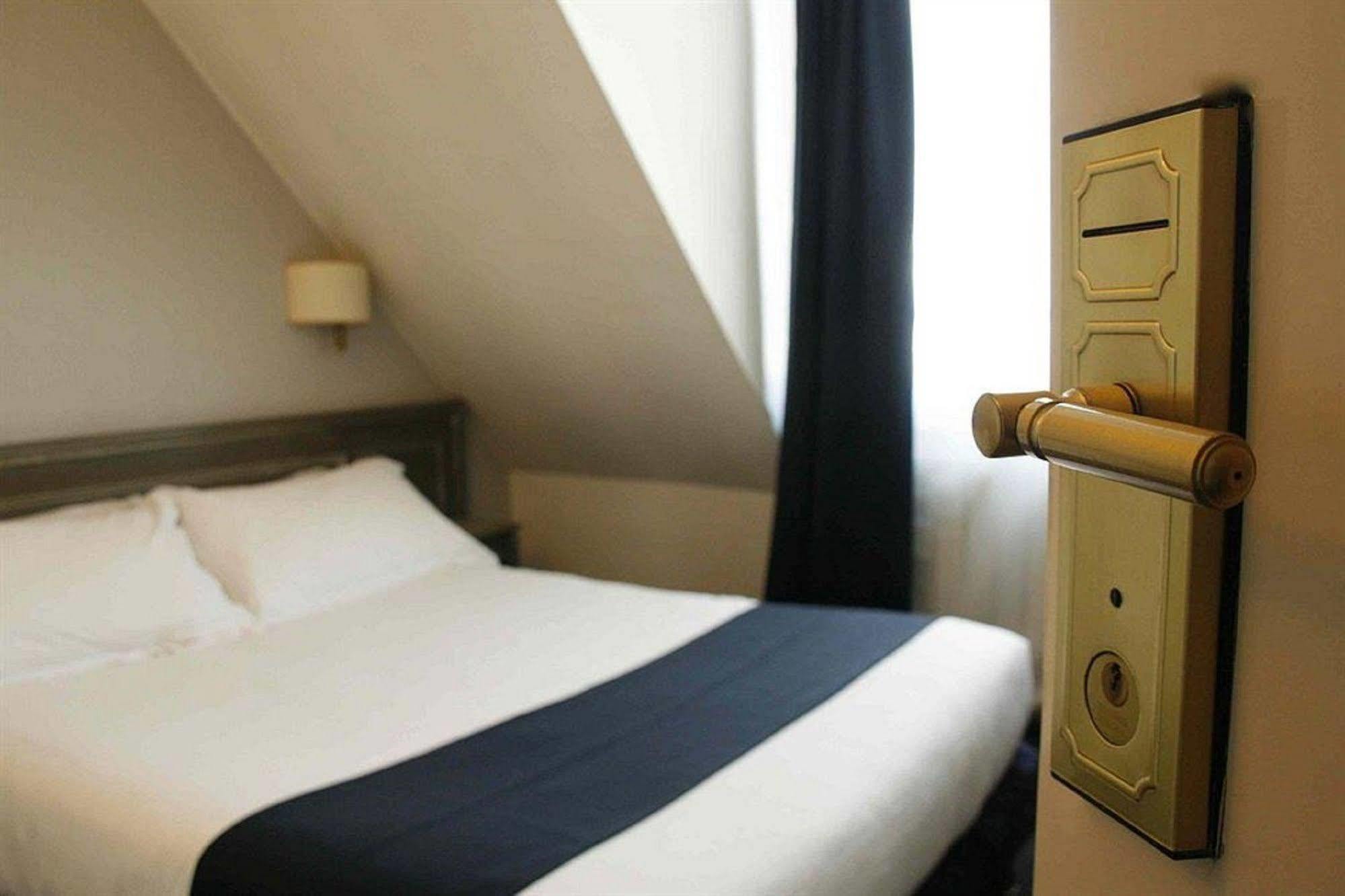 Hotel Chateau D'Eau Париж Стая снимка